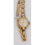 A ladies 9ct gold Omega wristwatch, Roman numerals, bracelet strap, total gross weight approx 17.