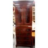 An Edwardian Sheraton style mahogany wardrobe centre, originally forming part of a larger piece,