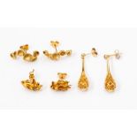 Three pairs of 9ct gold earrings, to include a drop honeycomb version, multi circle row and an