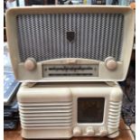 Two ivory coloured mid 20th century bakelite valve radios one named ‘Ultra’, the other not named