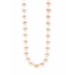 A cultured circle pearl and 9ct white gold necklace, comprising off round white pearls with pink