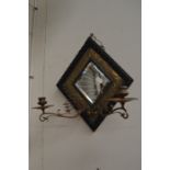 An Arts and Crafts oak brass wall mirror, 38cm high, 31cm wide