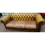 A Victorian style leather Chesterfield three seater settee