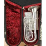 A 20th Century Boosey & Hawkes Cornet, Imperial, silver plated, together with a brass trumpet, by