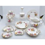 A Royal Crown Derby Derby Posies part coffee set including cups, saucers, side plates, jug, bell,