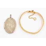 A silver oval locket photo frame and a gold plated tree bark pattern bracelet (2)