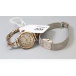 Tissot, a lady's 9ct gold white gold Tissot wristwatch, the square silvered dial with baton numerals