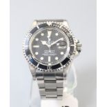 Rolex. A gentlemans stainless steel Rolex oyster perpetual submariner 1680 black enamel dial, lumino