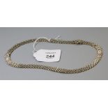 A 9ct bi-coloured brick necklace of polished and textured links, 43cm length, 24.9g