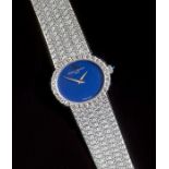 Baume and Mercier, a lady's diamond wristwatch, the midnight blue oval dial with arrow head hands, d