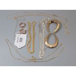 Five various 9ct gold chains, two pairs of hoop earrings, and a silver curb pattern necklace, 12.1g