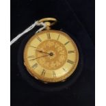 A continental open faced pocket watch, the engine turned dial with engraved foliate decoration and