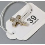 An 18ct gold diamond set cross, pavé set diamonds, 2 x 1.5cm