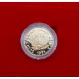 South African Mint, a boxed and cased nursing coin inscribed 'Verpleging Protea Nursing 1/10 oz fine