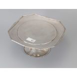 A 1930s Art Deco style silver cake stand/comport, with canted square top over a spreading foot, Shef