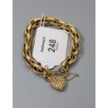 A 9ct gold engraved fancy cable link bracelet to pierced and engraved padlock clasp, 18.7g