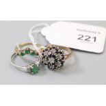 A sapphire and diamond multiple cluster ring, an emerald and diamond half hoop ring, and an emerald