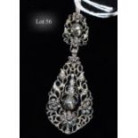 An antique silver, gold and rose diamond pendant, the open work pendalogue shaped pendant with flowe