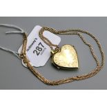 A 9ct gold heart shaped locket, foliate engraved to front to a flattened curb pattern chain, chain 5