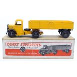 Dinky: A boxed, Dinky Supertoys, Bedford Articulated Lorry, 521, yellow and black body and