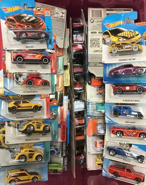 Hot Wheels: A collection of assorted, carded, unopened, Hot Wheels vehicles, approximately 100