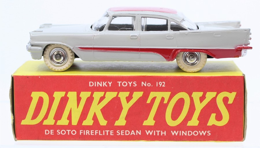 Dinky: A boxed, Dinky Toys, 192, De Soto Fireflite Sedan with Windows, two-tone grey and red body,