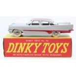 Dinky: A boxed, Dinky Toys, 192, De Soto Fireflite Sedan with Windows, two-tone grey and red body,