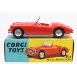 Corgi: A boxed, Corgi Toys, M.G.A. Sports Car, 302, red body, slight paint chips, box worn.