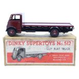 Dinky: A boxed, Dinky Supertoys, Guy Flat Truck, 512, maroon cab and body, slight paint chips, box