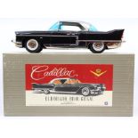 Marusan: A boxed Marusan Cadillac Eldorado Brougham, #110, black vehicle, silver roof, blue windows,
