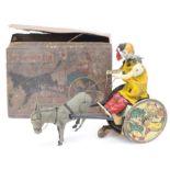 Lehmann: A boxed, German clockwork, mule and cart, circa 1900, Made by Lehmann, in working order,