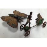 **WITHDRAWN**A 1920's tin plate mechanical dragonfly on wheels, Clockwork, One wing strut missing,