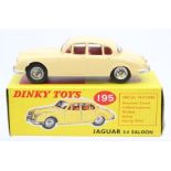 Dinky: A boxed, Dinky Toys, 195, Jaguar 3.4 Saloon, cream body, red interior, illustrated box,