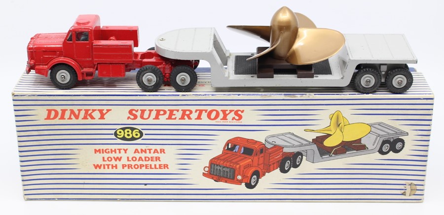 Dinky: A boxed Dinky Supertoys, Mighty Antar Low Loader with Propeller, 986, red cab, grey trailer