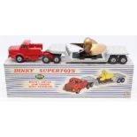 Dinky: A boxed Dinky Supertoys, Mighty Antar Low Loader with Propeller, 986, red cab, grey trailer