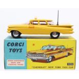 Corgi: A boxed, Corgi Toys, Chevrolet New York Taxi Cab, No. 221, yellow body, red interior, with