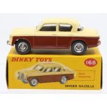 Dinky: A boxed Dinky Toys, Singer Gazelle, 168, two-tone brown and cream body, slight crushing to