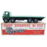 Dinky: A boxed, Dinky Supertoys, Foden Flat Truck, 502, green cab and body, slight paint chips,