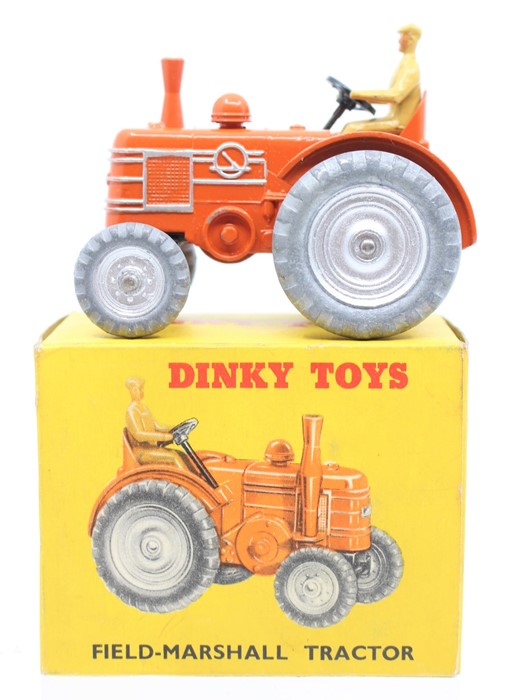 Dinky: A boxed, Dinky Toys, Field-Marshall Tractor, 301, orange body, with inner packing, slight