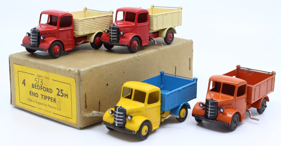 Dinky: A trade box, Dinky Toys, comprising four, 25M, Bedford End Tipper, two examples in red and