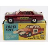 Corgi: A boxed Corgi Toys, Rover 2000 in Monte Carlo Trim, 322, metallic maroon body with white