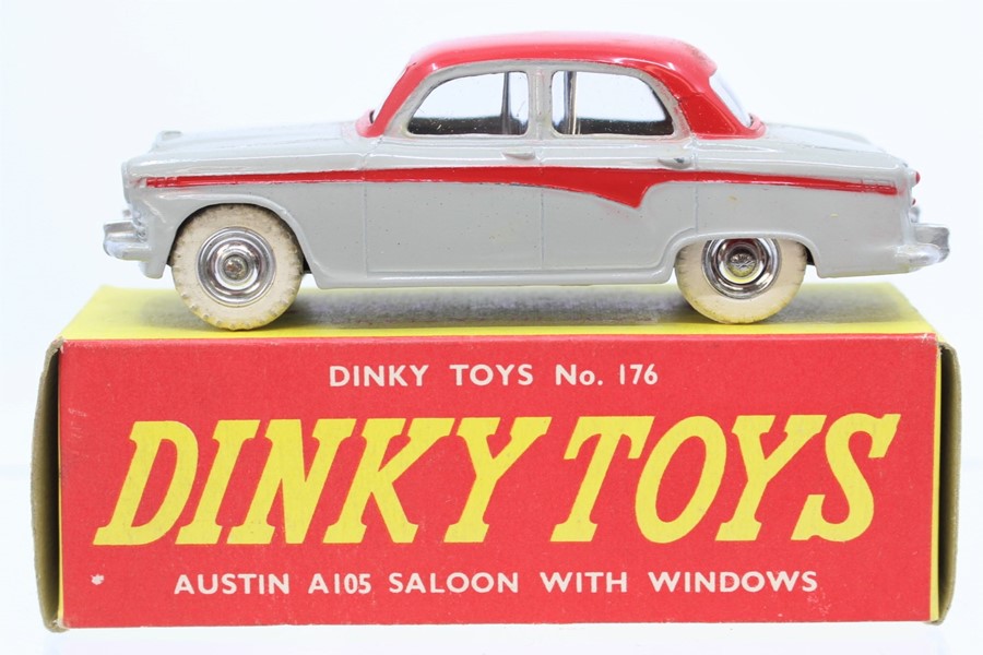 Dinky: A boxed, Dinky Toys, 176, Austin A105 Saloon, grey and red two-tone body, in yellow and red