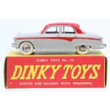 Dinky: A boxed, Dinky Toys, 176, Austin A105 Saloon, grey and red two-tone body, in yellow and red