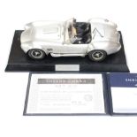 Franklin Mint: A Shelby Cobra 1:12 scale, fine Pewter model, No. 909/1000. R/h exhaust loose,