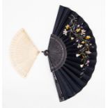 A bone brise fan, 19th Century, 17cm, together with an embroidered silk and ebony fan, worked with