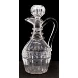 A 19th Century glass decanter and stopper, circa 1820-40, of mallet shape with strap handle and