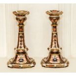 A pair of Royal Crown Derby Imari candlesticks, decorated with pattern 1128, 16cm high. (2)