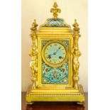 An Elkington ormolu and champleve enamel mantel clock,