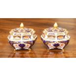 A pair of Royal Crown Derby Imari cushion form boxes and covers, decorated with pattern 1128, 8cm