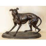 A French bronzed figure of a greyhound, 19th/20th Century, modelled standing and with head turned